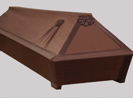 wooden casket – draped