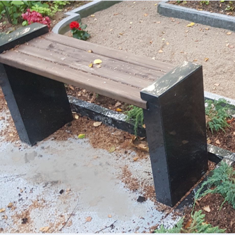 Granite bench with straight legs and a wooden top